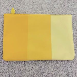 NWOT - Shades of yellow Faux leather - Cosmetic Bag/Clutch - 7.5X5”